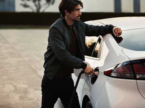 Image of the IONIQ Electric being charged at the fast-charger station.