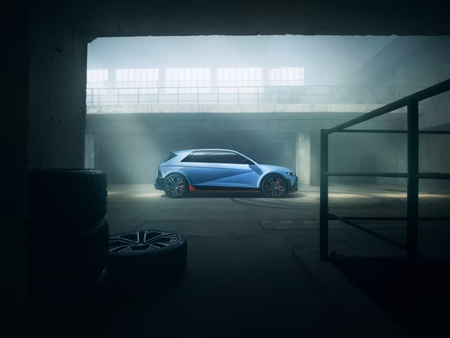 The all-electric Hyundai IONIQ 5 N seen bathed in sunlight from the side in a garage.